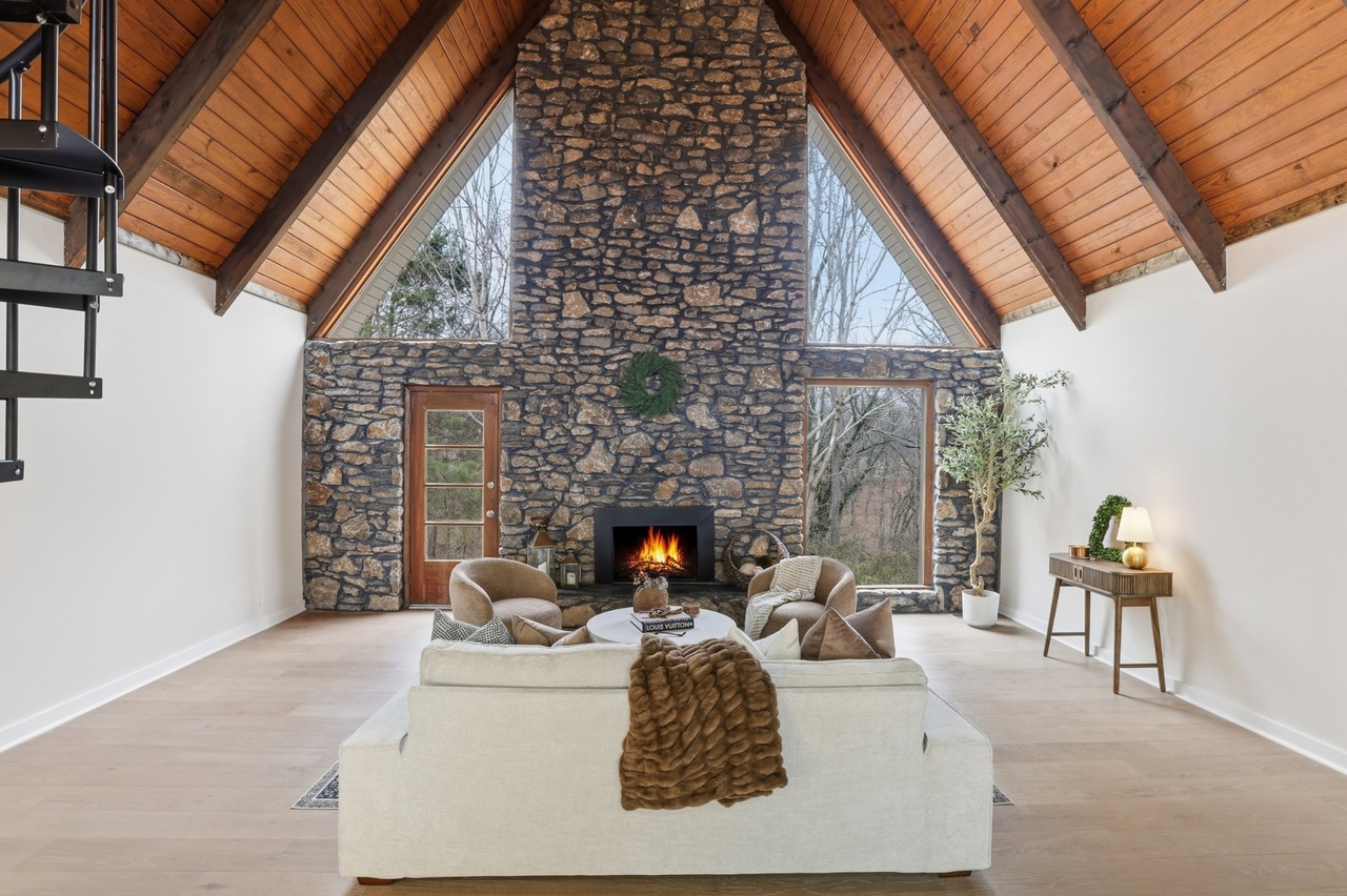 A-frame with floor-to-ceiling stone fireplace